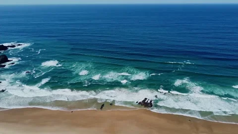 4K aerial view ocean waves rocky, cliffs sandy coast, beach Portugal  2023 Video stock 240659069