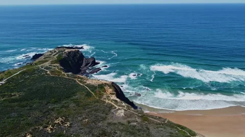 4K aerial view ocean waves rocky, cliffs sandy coast, beach Portugal Stock Footage 240659294
