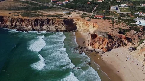 4K aerial view ocean waves rocky, cliffs sandy coast, beach Portugal  2023 Stock Footage 240659473