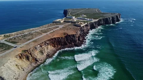 4K aerial view ocean waves rocky, Sagres Fortress Sagres Point  Algarve Portugal Video stock 240659481