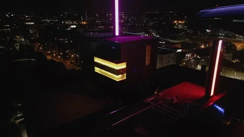4K Aerial View Orbiting The Top Of Guthrie Theater In Minneapolis At Night Stock Footage 225649982