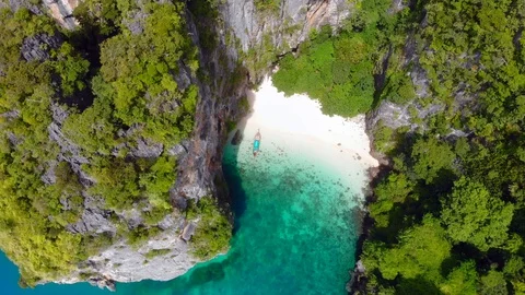 4k aerial view over hidden beach on remote island in Thailand Stock Footage 108437847