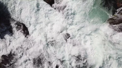 4K Aerial View over the River Rhein Waterfall with rock and sparkling water. Stock Footage 90774607