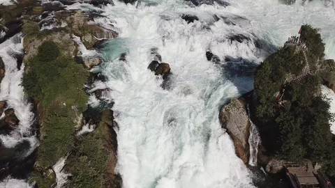 4K Aerial View over the River Rhein Waterfall with rock and sparkling water. Stock Footage 90774689