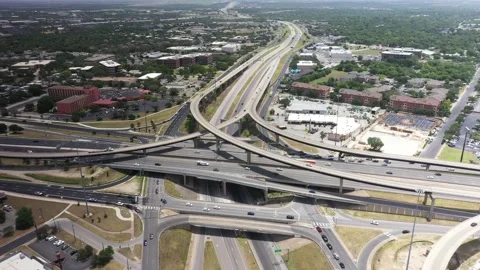 4K Aerial view over US 290 &amp; IH-35 interstate Spaghetti highway junction. Stock Footage 197448471