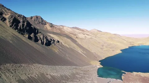 4K aerial view pan forward glacier lake mountains Vídeo Stock 65564980