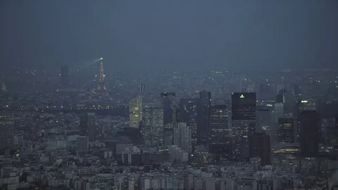 4K Aerial view of Paris with the Eiffel Tower illuminated at night - EDITORIAL Stock Footage 77193685