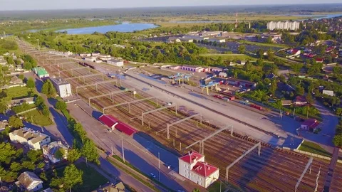 4K Aerial View Passenger  Train Movement Near Railway Staion Stock Footage