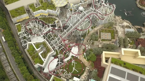 4K Aerial view of roller coaster at Universal Studios theme park in Singapore Stock Footage 107894018