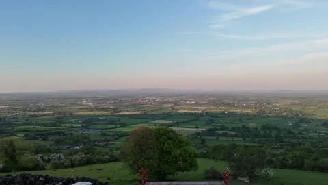 4K Aerial View of Rolling Hills and Rural Landscape at Sunset Vidéo 333932510