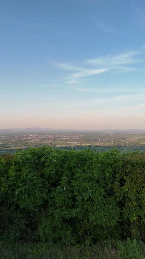 4K Aerial View of Rolling Hills and Rural Landscape at Sunset Stock Footage 333932596