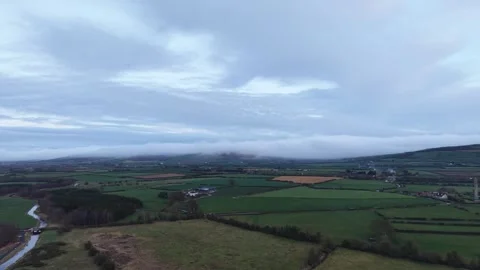 4K Aerial View of Rural Fields and Rolling Hills Видео 333926877