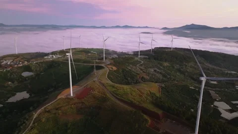 4K Aerial View Of Sea of Clouds and Windmills at Cau Dat Tea Hill, Vietnam Stock Footage 322562488