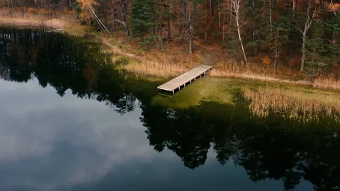 4K Aerial view of small bridge in Asveja lake in autumn Stock Footage 122233519