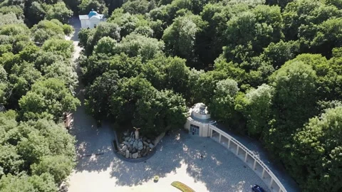 4k aerial view of the Smirnovsky spring with mineral water and Mount Beshtau Stock Footage 150391085
