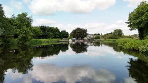 4K Aerial View of Stone Bridge Over Calm River 库存影片 333336003