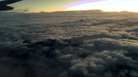 4K Aerial View of Sunset Glow and Dark Clouds Real Footage Video stock 338001837
