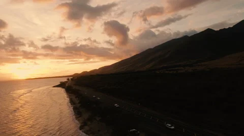 4K Aerial View: Sunset Over The Pacific Ocean/Hawaii with Traffic Stock Footage 66002401