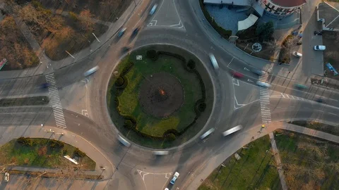 4k aerial view timelapse of roundabout road with circular cars. Stock Footage 126860098