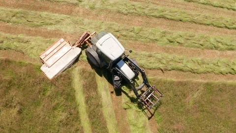 4K Aerial View of Tractor Cutting Grass in Rural Devon Stock Footage 112006579