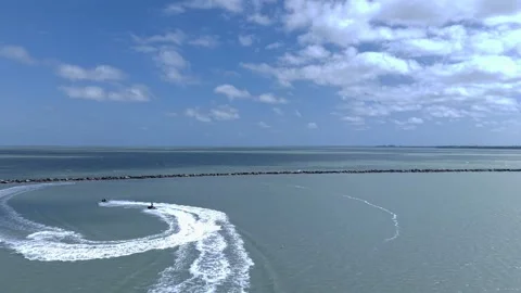4K Aerial View of Two Personal Watercraft Riding on Corpus Christi Bayfront Stock Footage 331622176