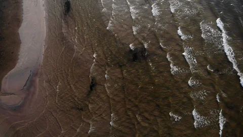 4k aerial view of waves on the beach of Jurmala Stock Footage 112869562