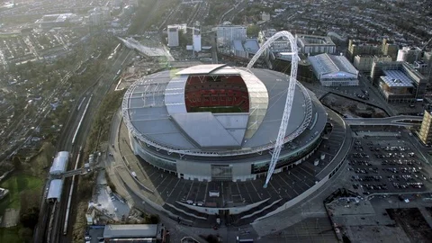 4K Aerial view of Wembley stadium, showing the building's distinctive arch Stock Footage