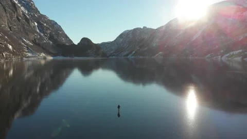 4K Aerial Walking over Massive frozen lake in Stock-Footage 168769629
