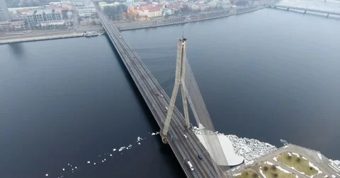 4K Aerial winter view of cable-stayed bridge over Daugava river in Riga Latvia Stock Footage 72279768