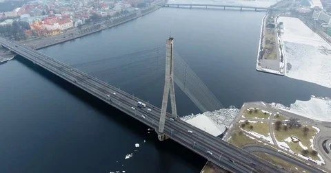 4K Aerial winter view of cable-stayed bridge over Daugava river in Riga Latvia Stock Footage 72281187