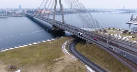 4K Aerial winter view of cable-stayed bridge over Daugava river in Riga Latvia Stock Footage 72282864