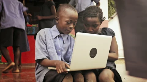 4k of African students / pupils using laptop computer during lunch break at scho Video stock 199625026