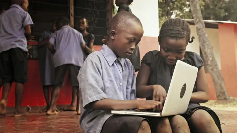 4k of African students / pupils using laptop computer during lunch break at scho Stock Footage 199625056