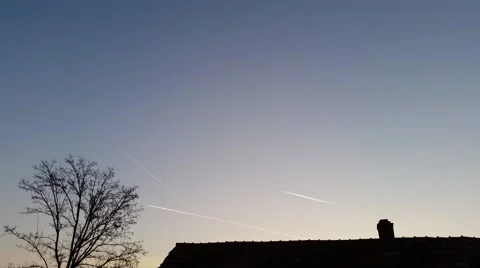 4K Airplane Contrails at Sunset Stock Footage 53348151