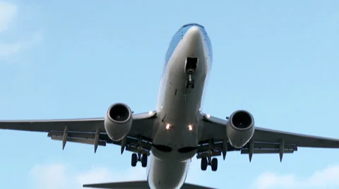 4K Airplane flying overhead Stock Footage 34992356