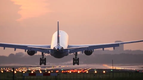 4K Airplane landing at dusk Stock Footage 51093679