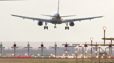 4K Airplane landing at sunset Stock Footage 34994910