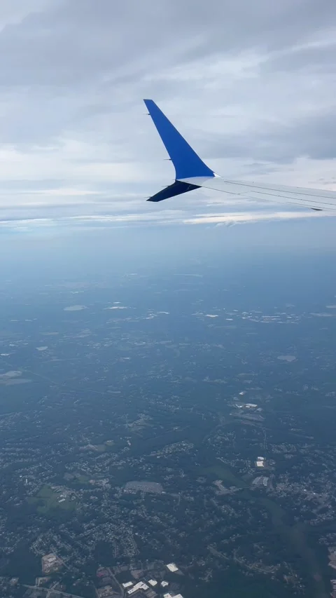 4K Airplane Window City View Vertical Stock Footage 337201348