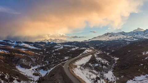 4K Amazing time lapse as seen from above a winding road in Utah near Ski Resorts Stock Footage 128377565