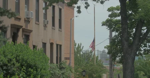 4K AMERICAN FLAG HALF MAST 1/2 MAST Stock Footage 65313005