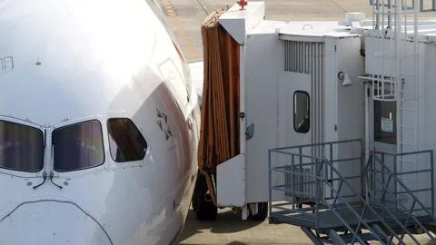 4K ANA Boeing 787-8 JA819A Jet Bridge Attachment at Matsuyama Airport Japan Stock Footage 335342386