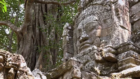 4K, Ancient stone faces statue of Ta Som temple. Angkor Thom Famous landmark-Dan Stock Footage 119058960