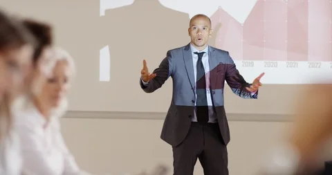 4K Annoyed business manager arguing with colleagues in boardroom meeting Stock Footage 101409141