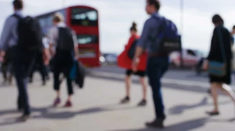 4K Anonymous crowd of people walking in London, in slow motion  Stock Footage 64910028