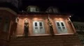 4k Antique medieval building with figures illuminated wall panning 4k or 4k+ Resolution
