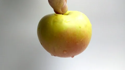 4K Apple in the hand Stock-Footage 99275763