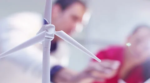 4K Architects or engineers working on renewable energy development with concept  Stock Footage 63357754