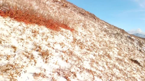 4K Arial revealing shot Drone Winter Wasatch Mountain Range Sunset Salt Lake Stock-Footage 258196030