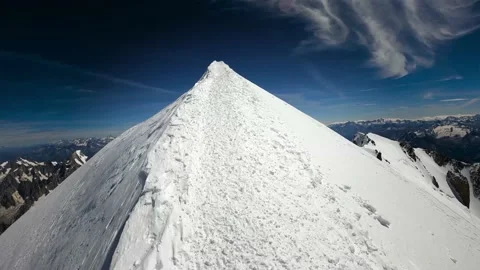 4K Arriving at the summit of a big mountain POV 3 Stock Footage 148022267