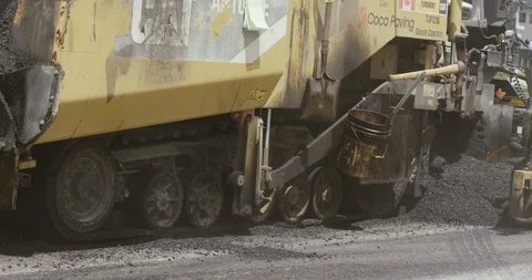 4K asphalt machine paving Stock Footage 112062013